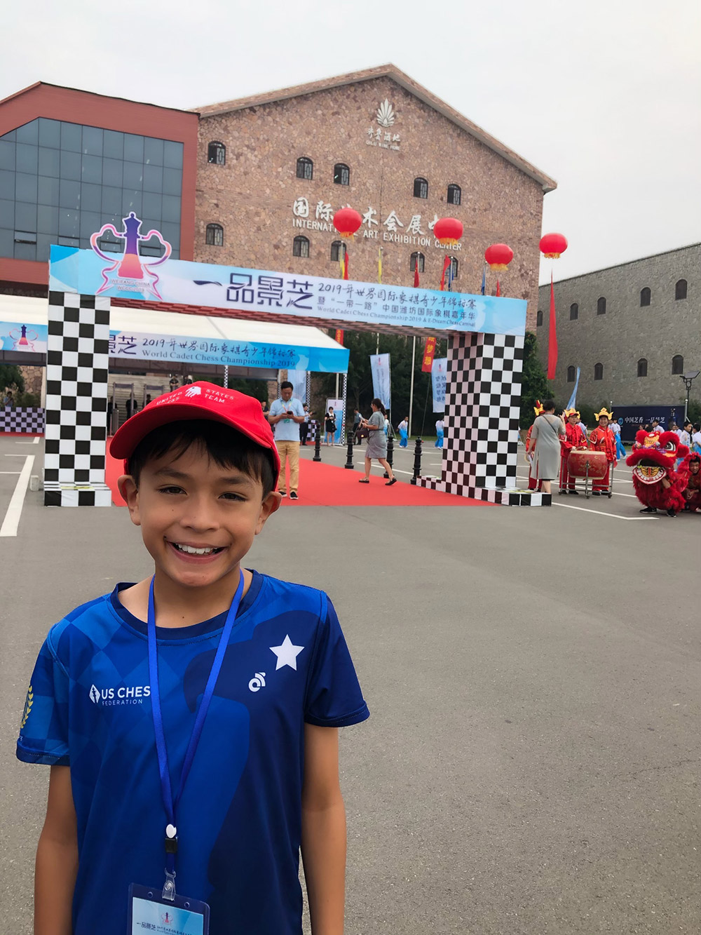 Oliver gets ready to enter the venue for the World Cadet Chess Championship in Weifang, China. August, 2019
