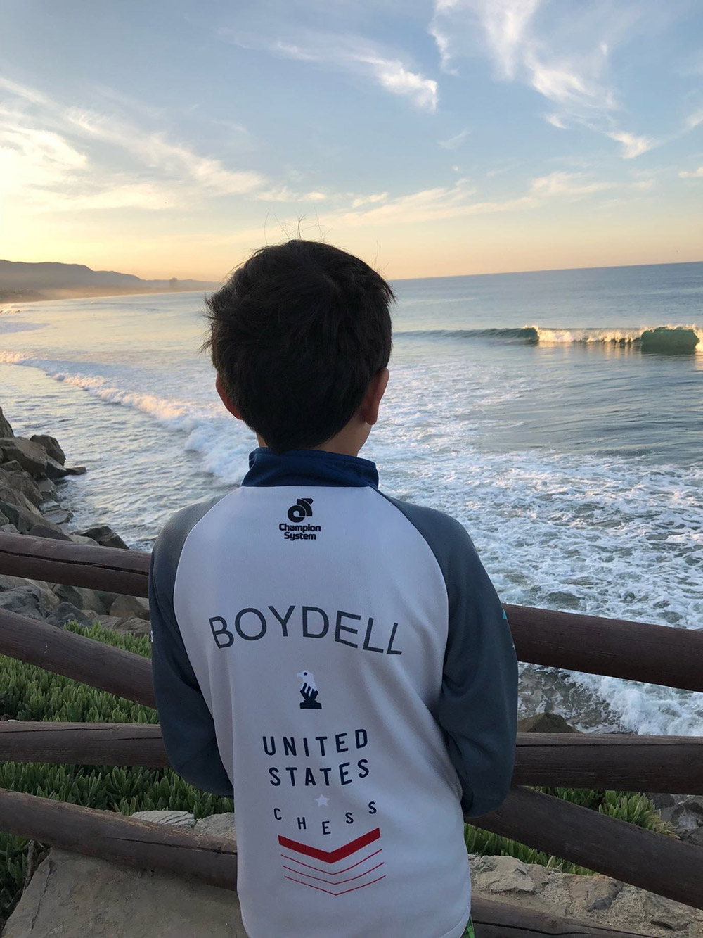 Oliver takes in the Pacific Ocean during a break from competition at the North American Youth Chess Championships in Mexico. November, 2018