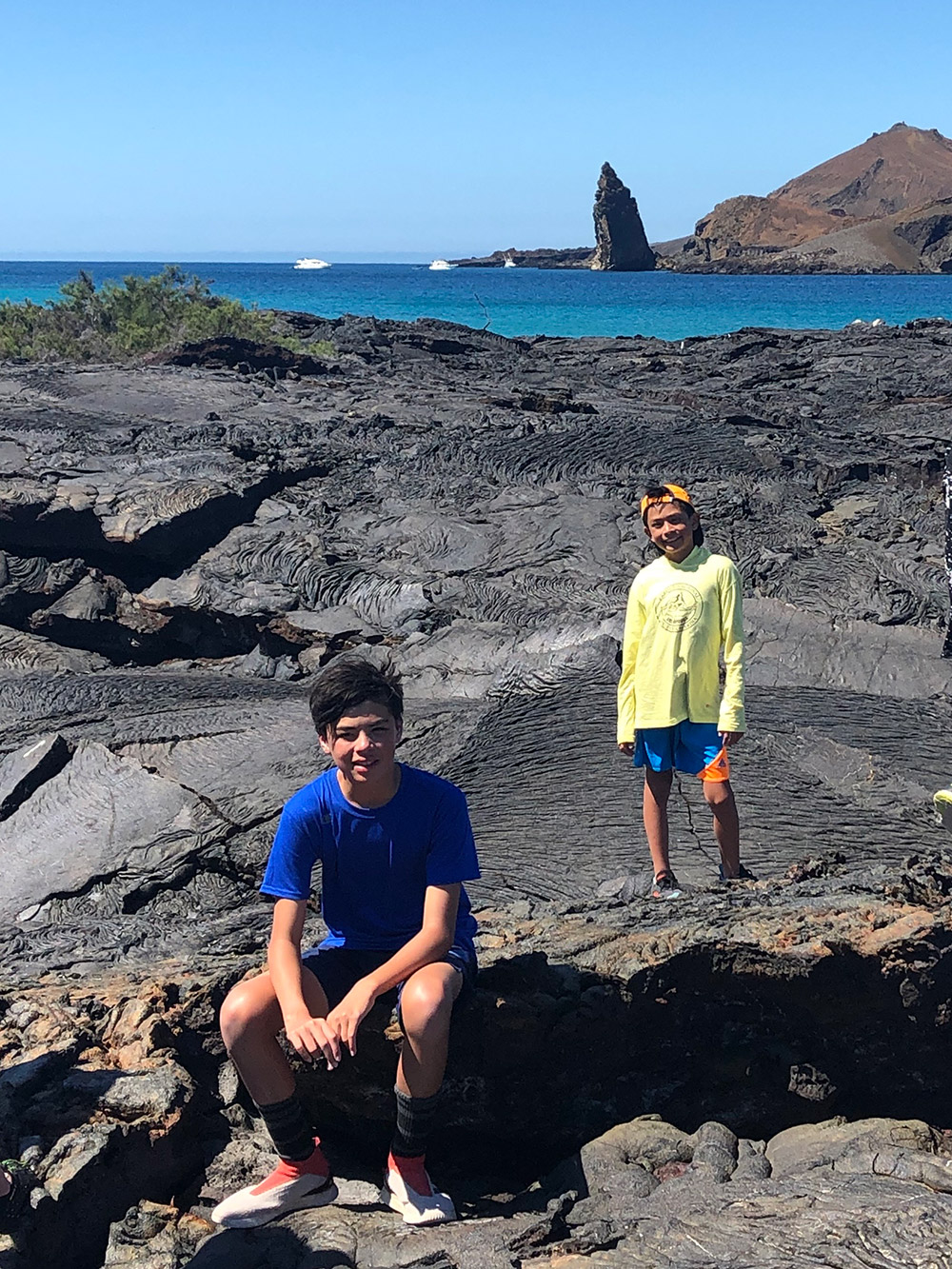 Oliver and his big brother Sebastien go for a hike on Santa Cruz Island, which was full of black rocks. July, 2019