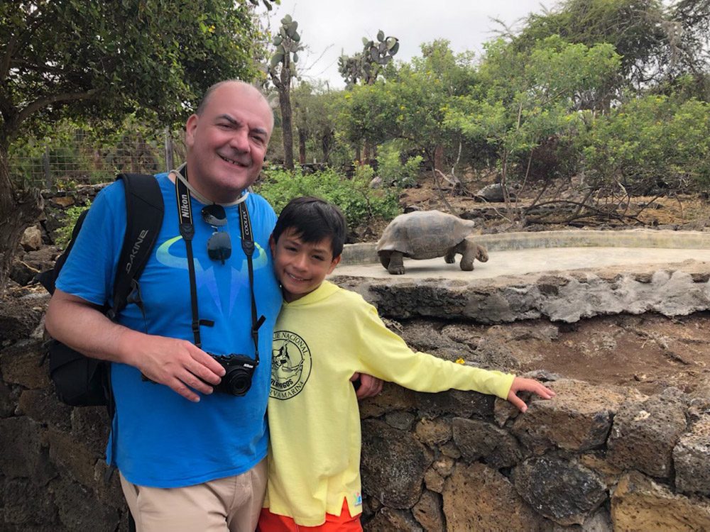 Oliver and his dad Paul at the Charles Darwin Research Station on the Galápagos Islands. July, 2019